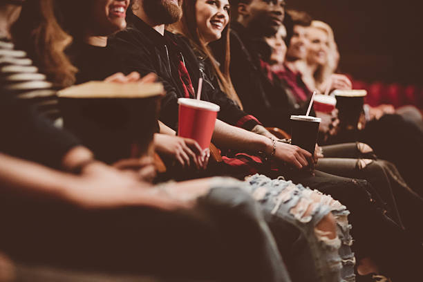 istock Group of people in the cinema 583844642
