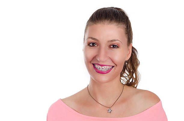 istock Portrait girl with braces 583847296