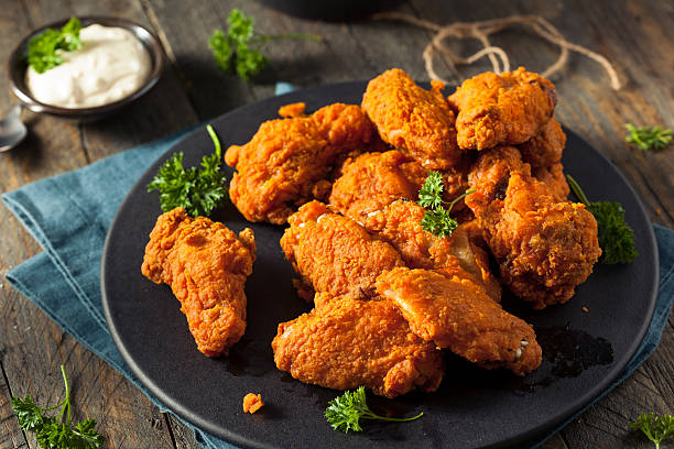 Spicy Deep Fried Breaded Chicken Wings Spicy Deep Fried Breaded Chicken Wings with Ranch dipping sauce photos stock pictures, royalty-free photos & images