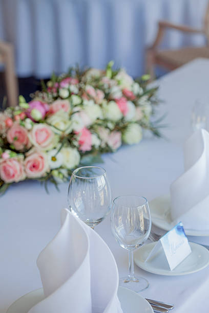 istock Glasses on restaurant. table appointments. wedding, floral decor 583848566