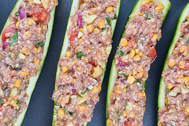 istock Raw courgettes stuffed with meat and vegetables 583854208