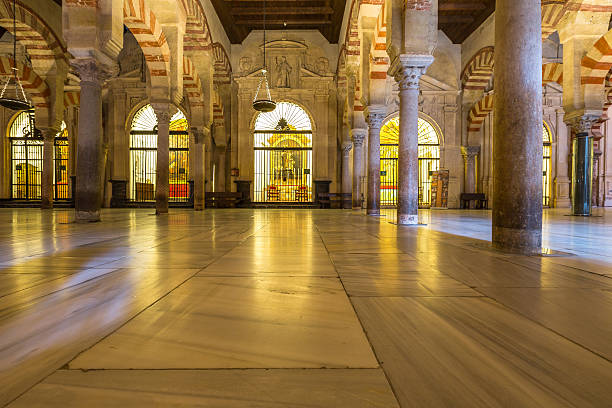 Cordoba, Andalusia, Spain - April 20, 2016: interior of the Great Mosque or Mezquita Catedral de Cordoba. Mezquita is a very popular tourist destination in Andalusia.