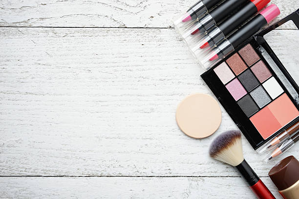 istock Set of colorful cosmetics on white table background 583859460