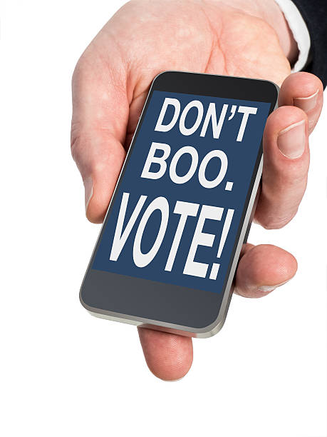 istock Smart Phone Has Message to Stop Complaining and VOTE! 583860980