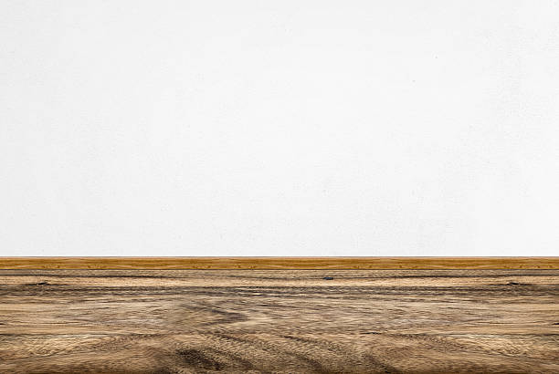 istock Empty room perspective,white concrete wall and wooden floor 583861470