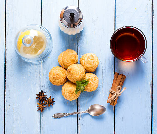 istock Coconut cookies and cup of tea 583959104