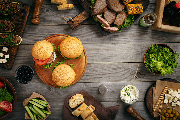 istock Different burgers with food cooked on the grill 583960018