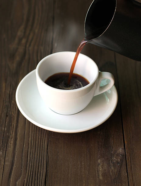 istock Hot coffee black coffee on the wood 583963076