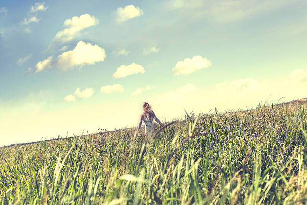 istock free woman in nature 583963092