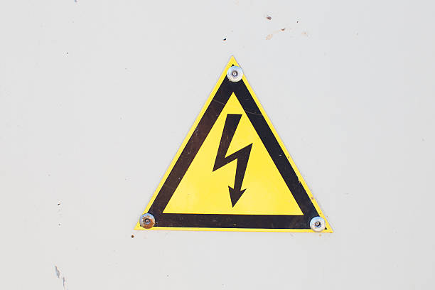 istock High Voltage Sign. Danger symbol. Warning icon 583963604