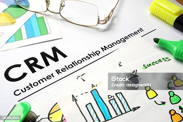 Paper With Words Crm Customer Relationship Management Stock Photo - Download Image Now