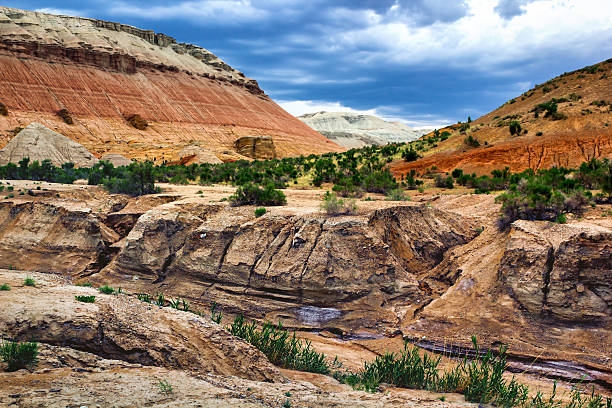 istock colorful mountains and dry river bed 583964414