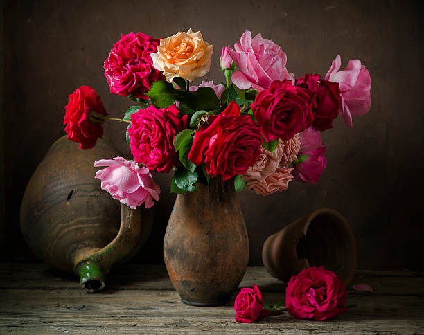 istock Red rose on wooden table 583964964