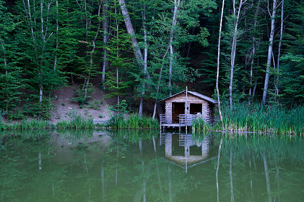 istock Wooden House by the Lake 583965246