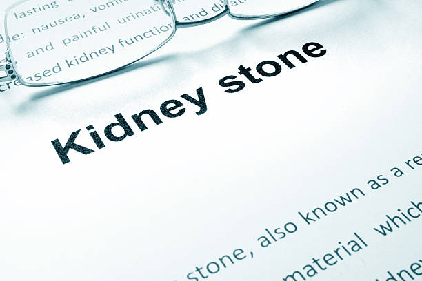 istock Kidney stone sign on a paper and glasses. 583965754