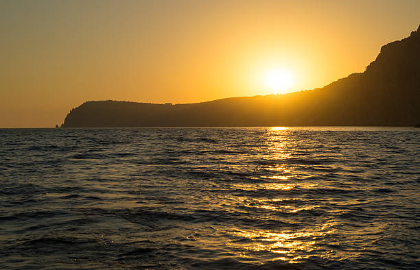 istock Sunset Over the Cape in the Sea 583966808