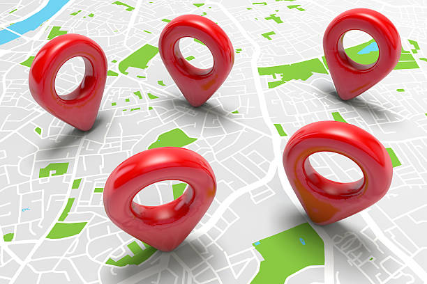 istock Red location markers on a city map 583968454