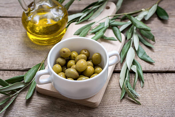 istock Bowl filled freshly harvested whole green olives 583970060