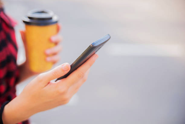 istock Woman texting on smartphone 583970444