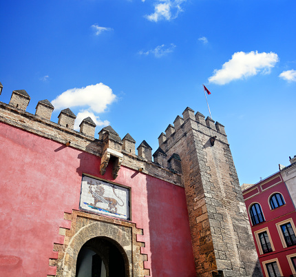 Lion Gate in the Royal Alcazar of Seville, Spain. Composite photo