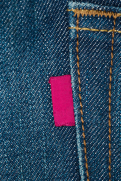 label on the back pocket of denim jeans.