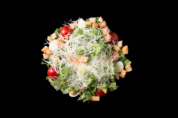 istock Caesar salad with prawns, cherry tomato and cheese 583972302
