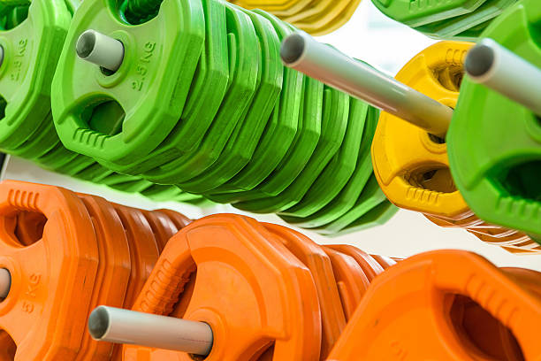 istock Closeup image of color dumbbells 583973370