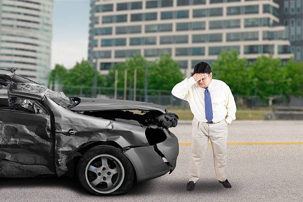 istock Stressful businessman after car accident 583973712