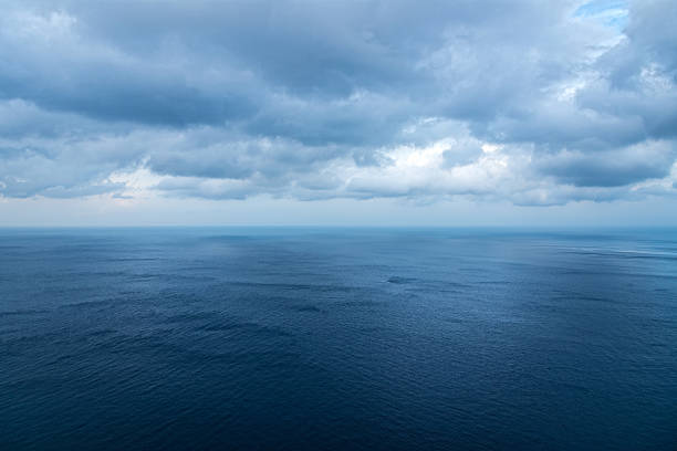 istock water surface from above - horizon over ocean 583974328