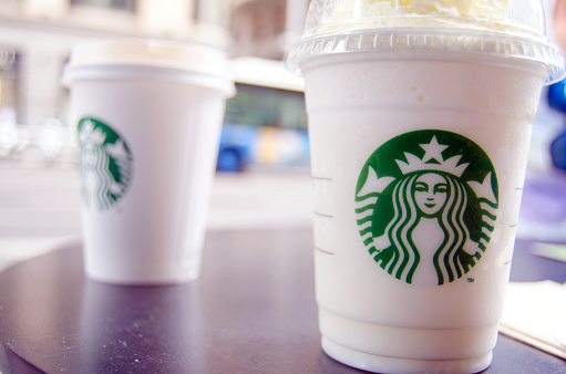 MadrId, Spain - July 31, 2015: Detail of two Starbucks drinks on a street terrace.