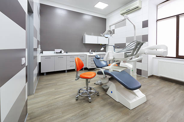 interior of modern dental office. - dentists chair fotos imagens e fotografias de stock