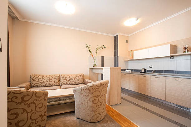 istock Hotel apartment living room and kitchen 583976918