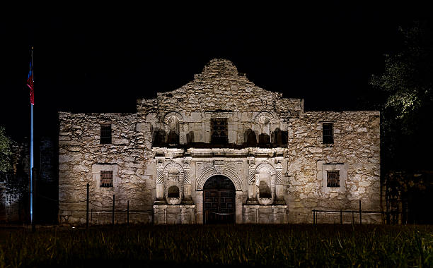 istock Front of The Alamo at night 583977230