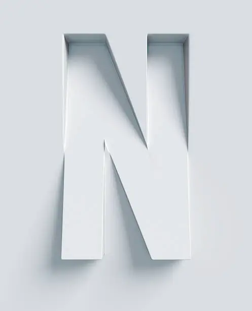 Letter N slanted 3d font engraved and extruded from the surface