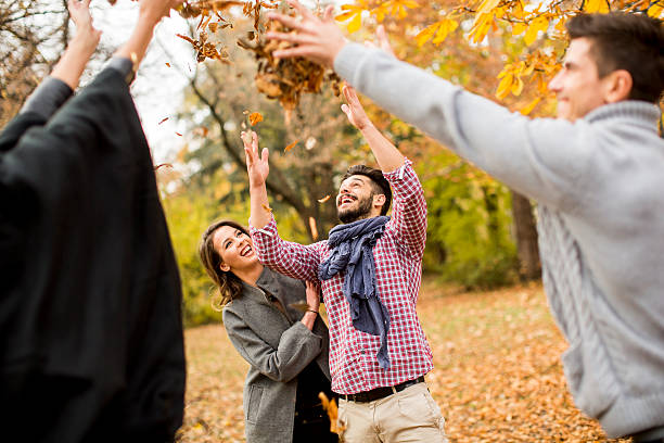 istock Young people having fun in the autumn park 583978548