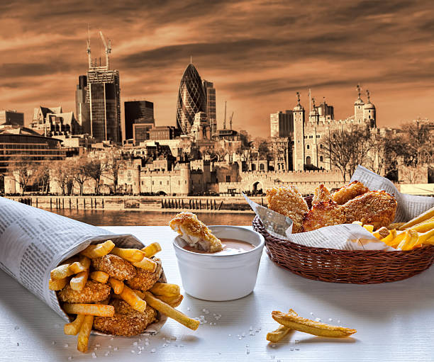 istock Fish and Chips against London, England 583978604