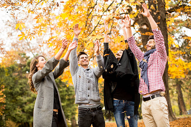 istock Young people having fun in the autumn park 583978896
