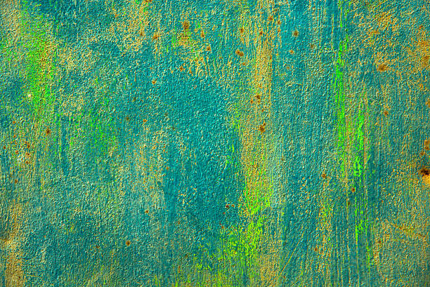 istock Blue green and rust in industrial metallic background 583983728