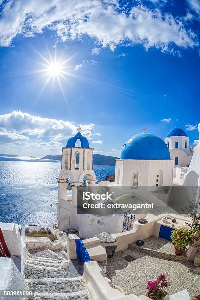 Oia Village In Santorini Island With Famous Churches Greece Stock Photo - Download Image Now