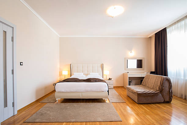 istock Modern elegant hotel bedroom interior 583984508