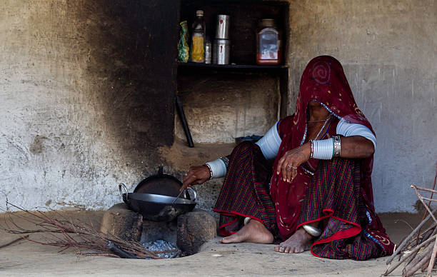 istock Indian women working in her kitchen 583984744