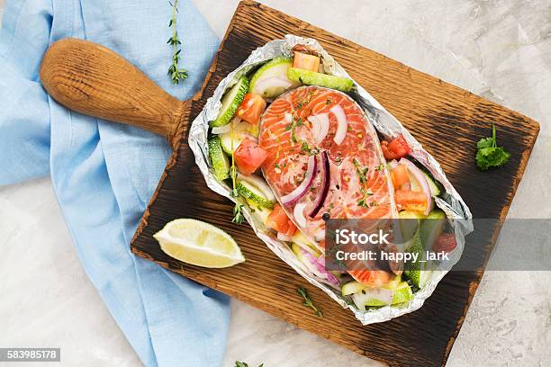 Raw Salmon Steak In A Foil Boat Stock Photo - Download Image Now - Foil - Material, Salmon - Seafood, Salmon - Animal