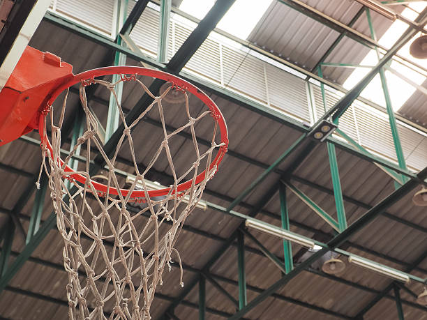 istock Basketball Hoop in Sport Hall 583986216
