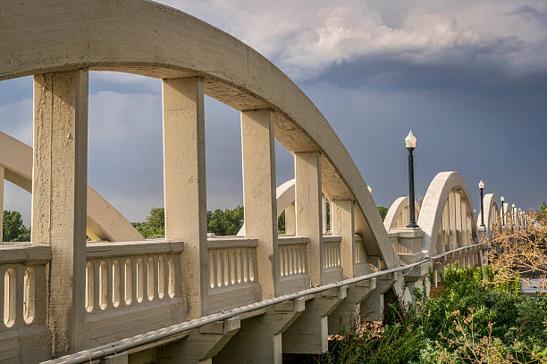 istock Concrete arch bridge over South Platte River 583987642