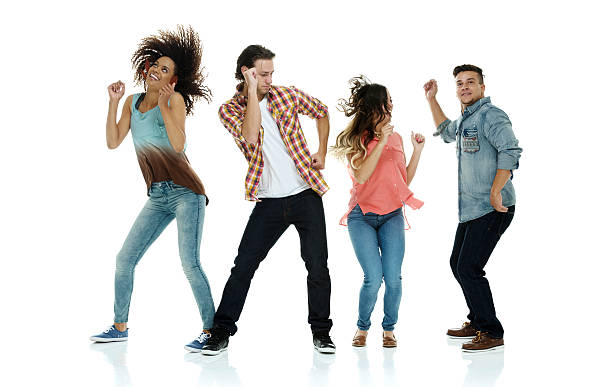 istock Four friends dancing together 583988022
