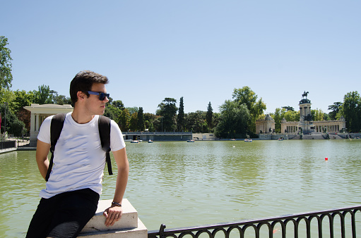 Young adult at a lake (Buen Retiro Park, Madrid).