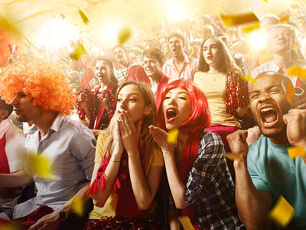 istock Sport fans: Group of cheering fans 583995096