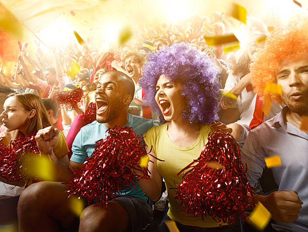 istock Sport fans: Group of cheering fans 583995356