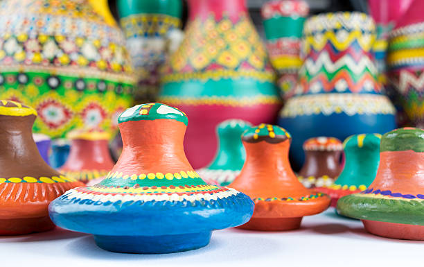 istock Pottery lids on blurred background of pottery vases 583995908