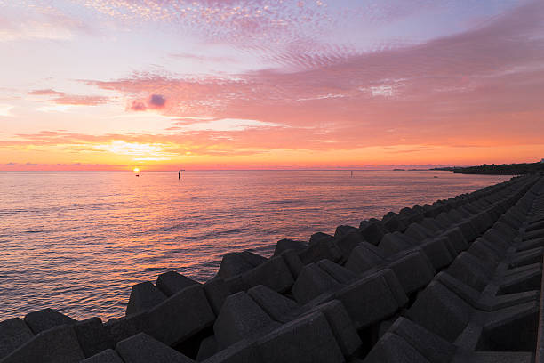 istock Sunset and tetrapod. Okinawa, Japan 584005620